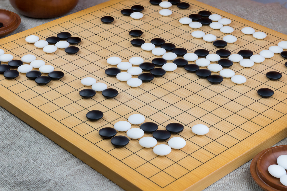 Google AI Takes Down Human Champ of World's Most Complex Board Game, The  Takeaway